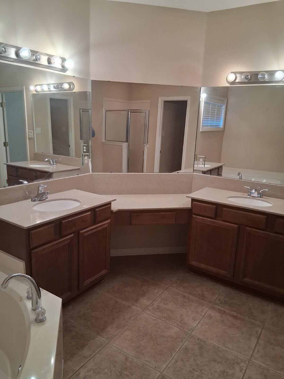 10481 Mabry Mill Road Cordova, TN 38016 - Photo 16 of 32 a bathroom with a sink double vanity and a mirror