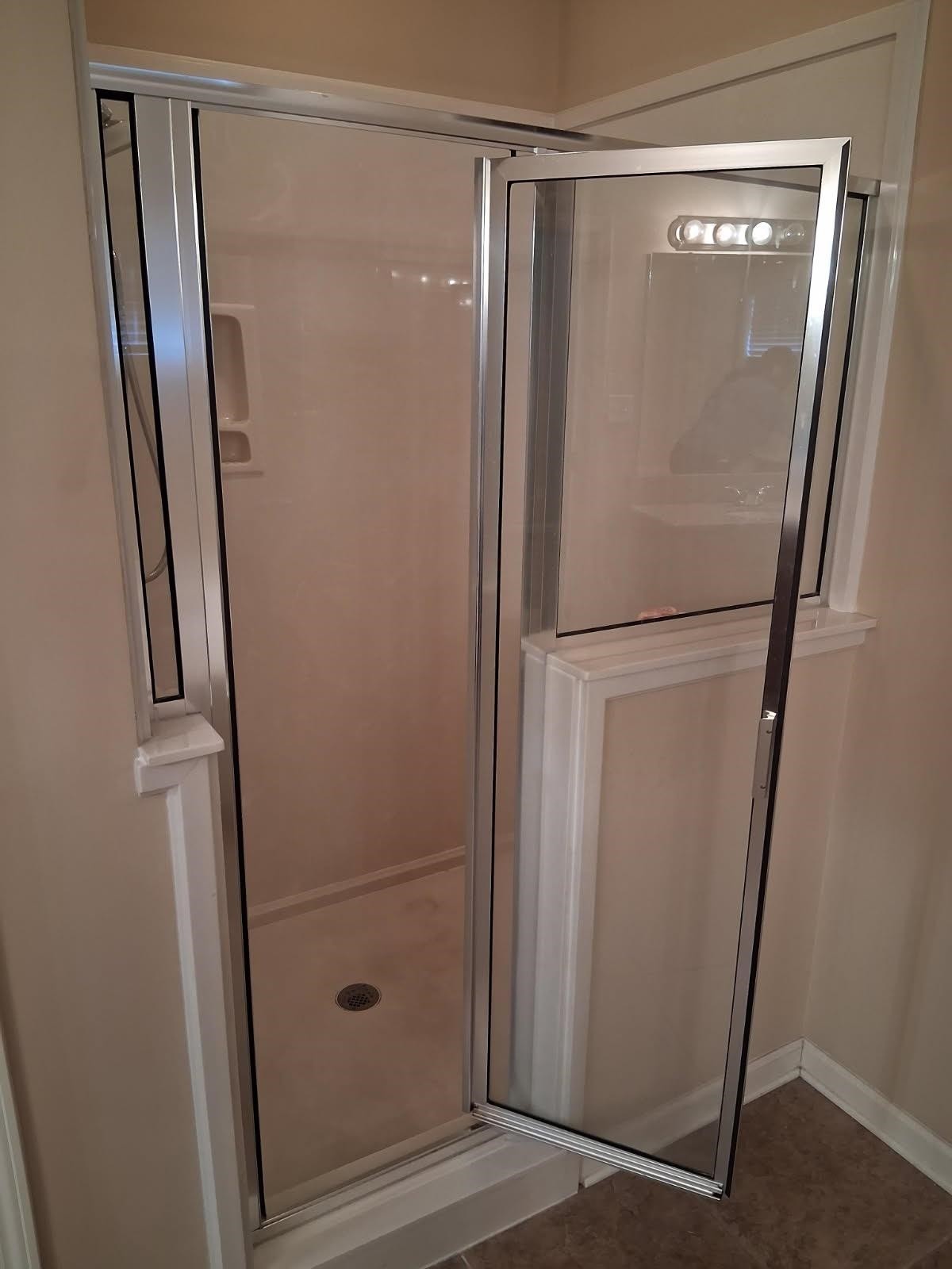 10481 Mabry Mill Road Cordova, TN 38016 - Photo 17 of 32 a bathroom with a glass shower door