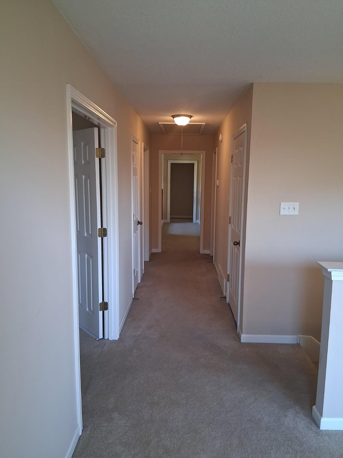 10481 Mabry Mill Road Cordova, TN 38016 - Photo 19 of 32 a view of a hallway with wooden shelves