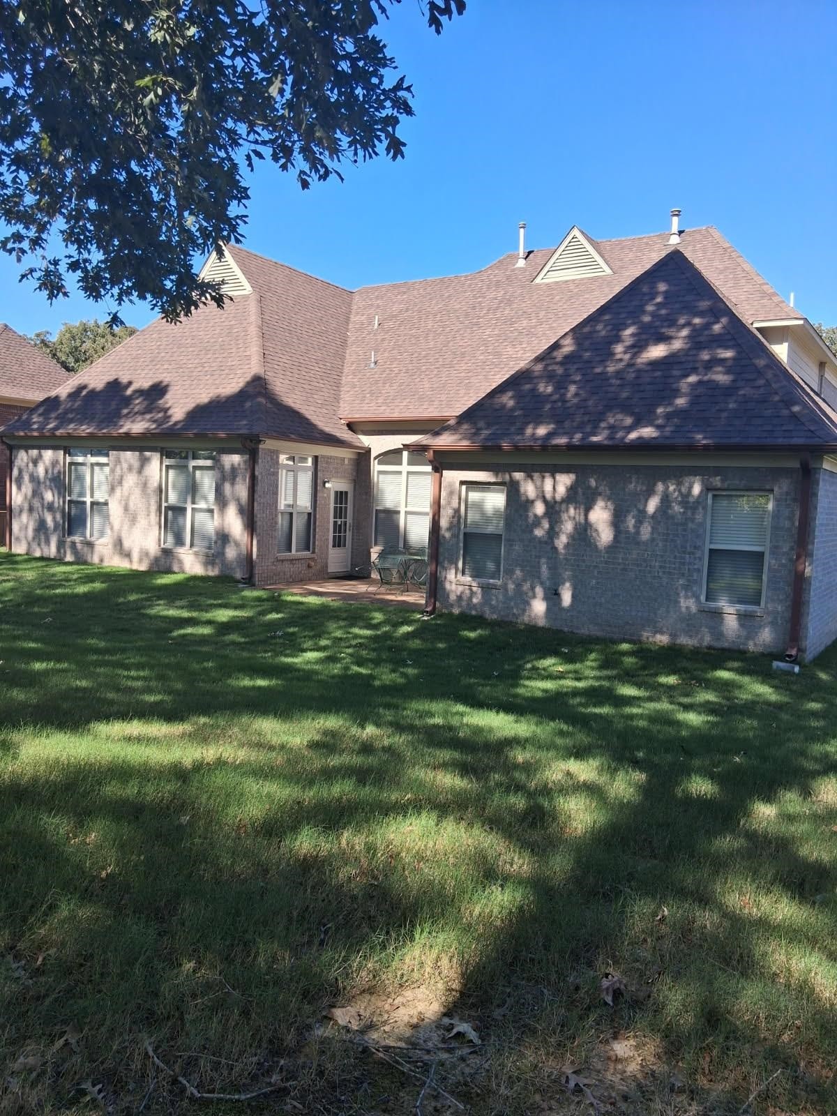 10481 Mabry Mill Road Cordova, TN 38016 - Photo 29 of 32 a front view of a house with a garden