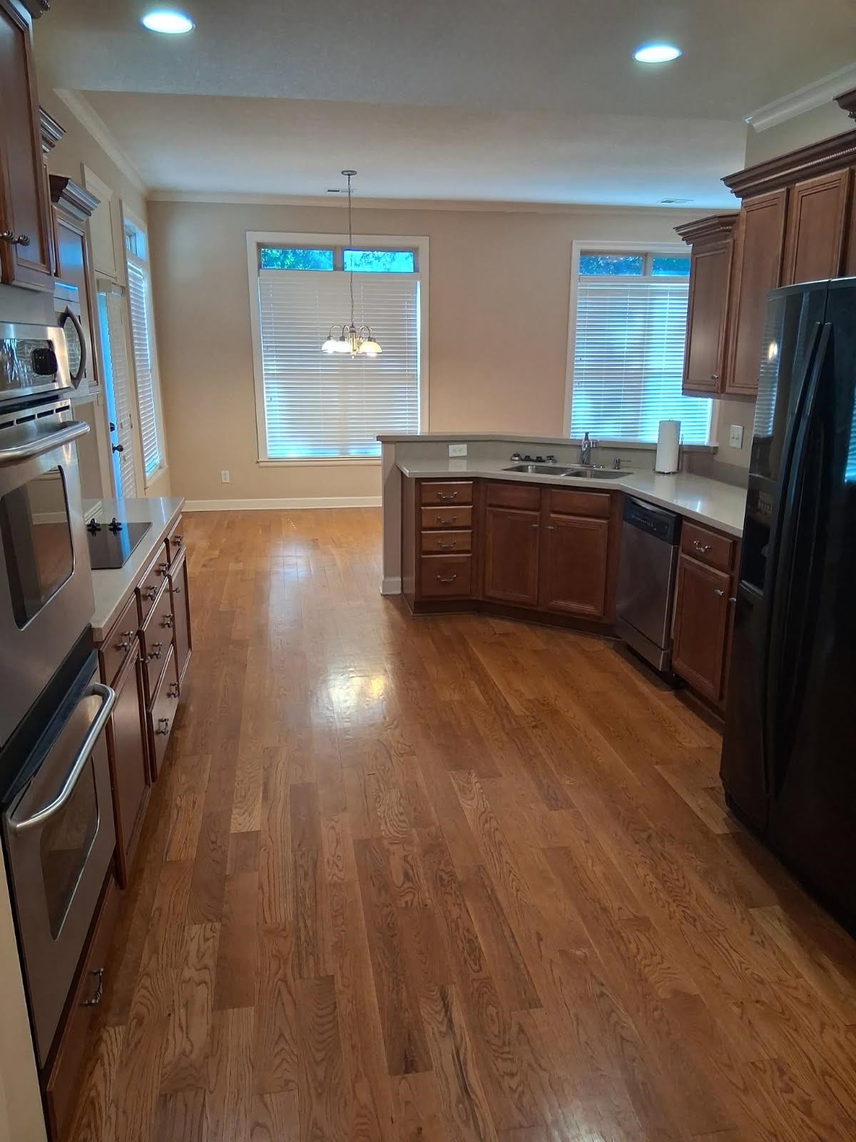 10481 Mabry Mill Road Cordova, TN 38016 - Photo 10 of 32 a kitchen with stainless steel appliances a sink a stove top oven a counter space and cabinets
