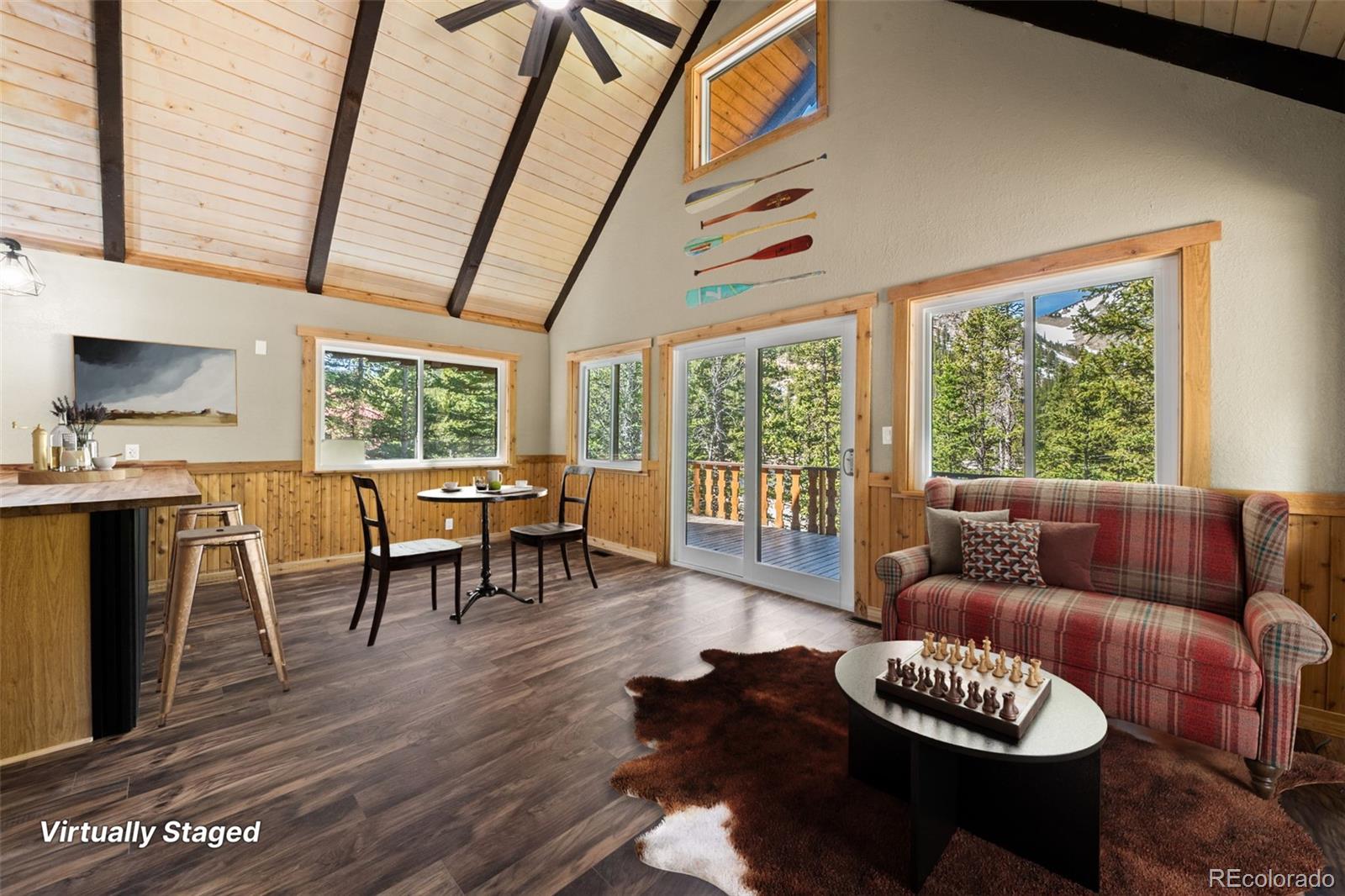 827 Mine Road Idaho Springs, CO 80452 - Photo 5 of 30 a living room with furniture and a large window