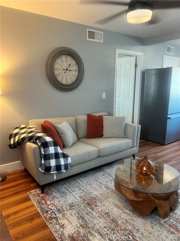 14035 Oakley Drive Riverside, CA 92503 - Photo 4 of 25 a living room with furniture and a rug