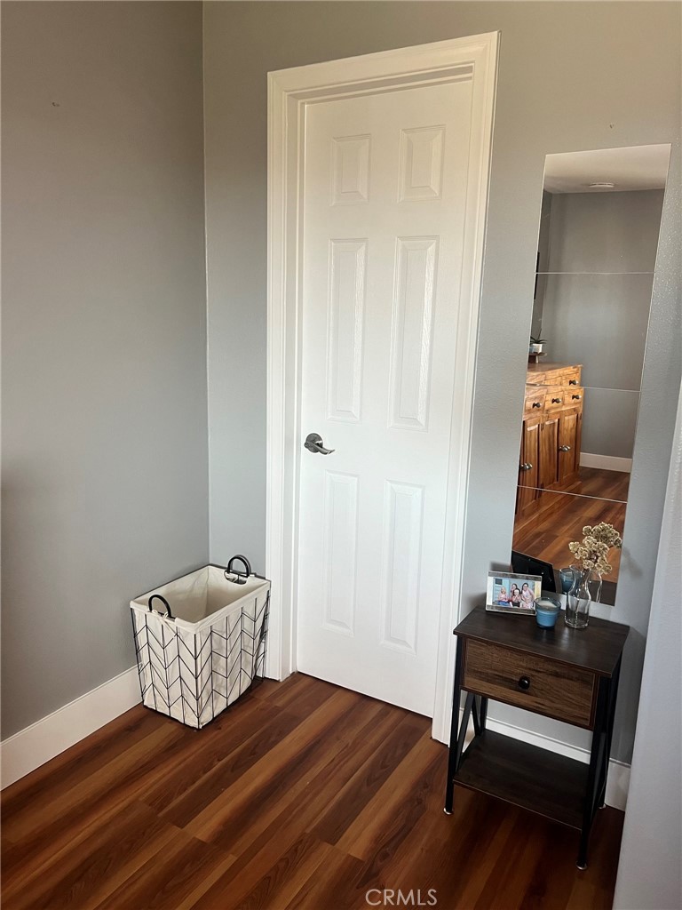 14035 Oakley Drive Riverside, CA 92503 - Photo 10 of 25 a living room with furniture and a wooden floor