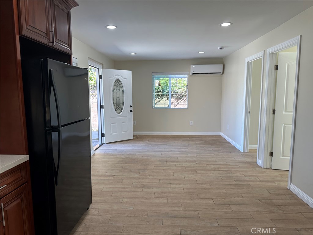 1636 West 214th Street Torrance, CA 90501 - Photo 2 of 14 a view of kitchen with a refrigerator cabinets and wooden floor