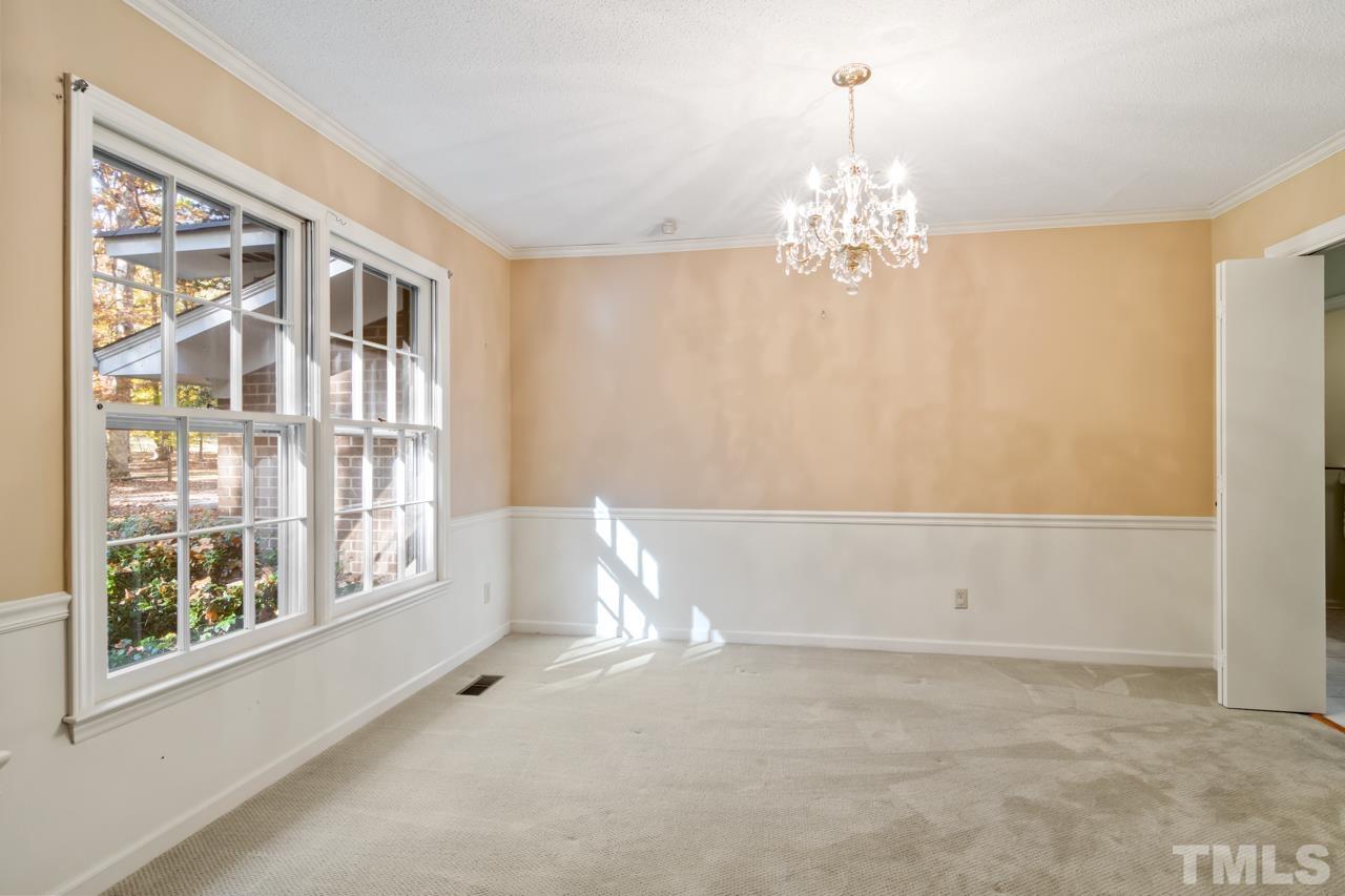 1208 John Jones Road Bahama, NC 27503 - Photo 4 of 30 a view of an empty room with a window