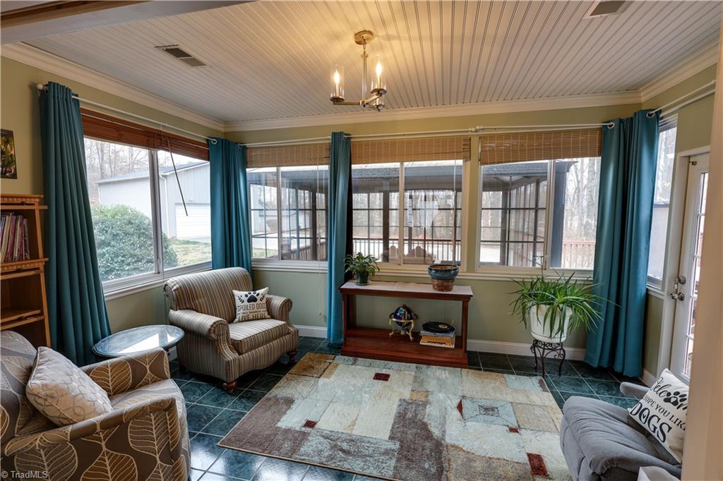 7925 Old Salisbury Road Linwood, NC 27299 - Photo 12 of 31 Sunroom with door to deck