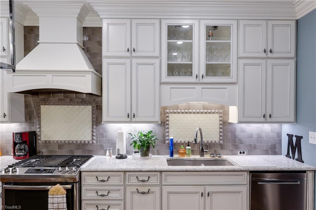 7925 Old Salisbury Road Linwood, NC 27299 - Photo 6 of 31 Double sink, stainless steel appliances including stove, refrigerator and dishwasher