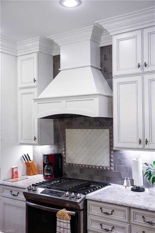 7925 Old Salisbury Road Linwood, NC 27299 - Photo 7 of 31 Beautiful custom hood vent with tile backsplash