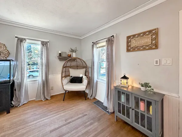 a room with furniture and a window