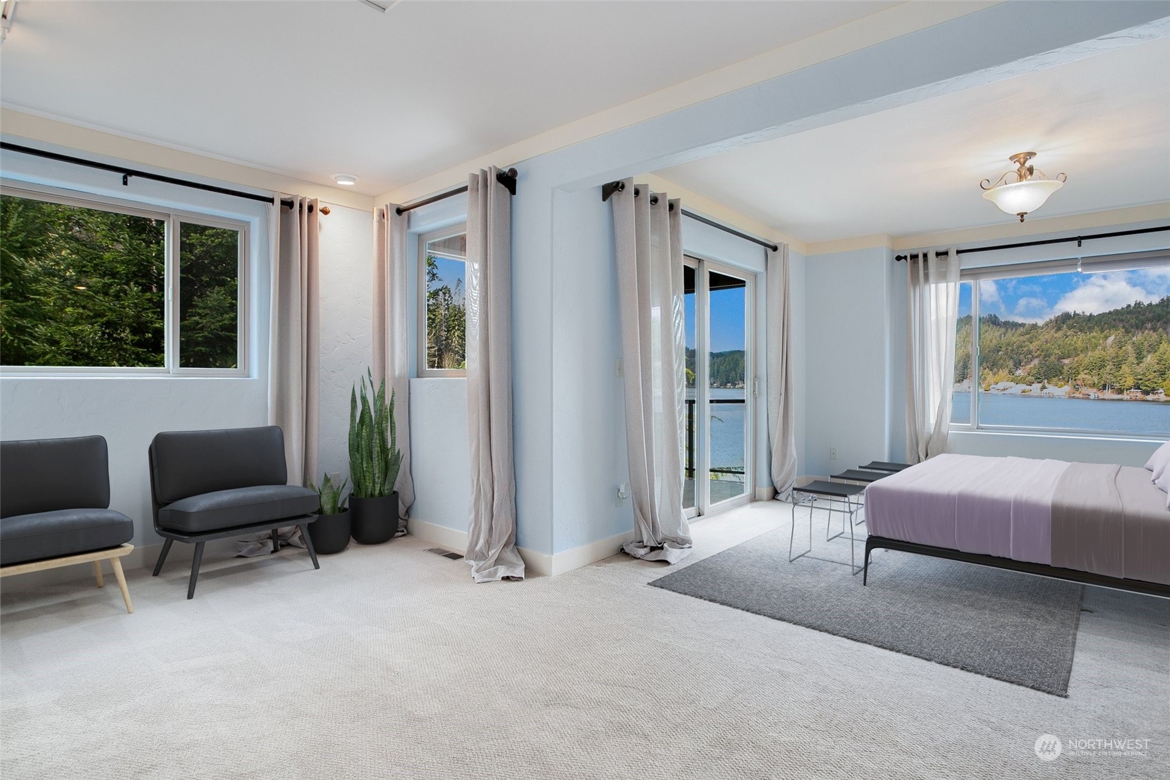 943 Summit Lake Shore Road Northwest Olympia, WA 98502 - Photo 12 of 40 a bedroom with furniture and a window
