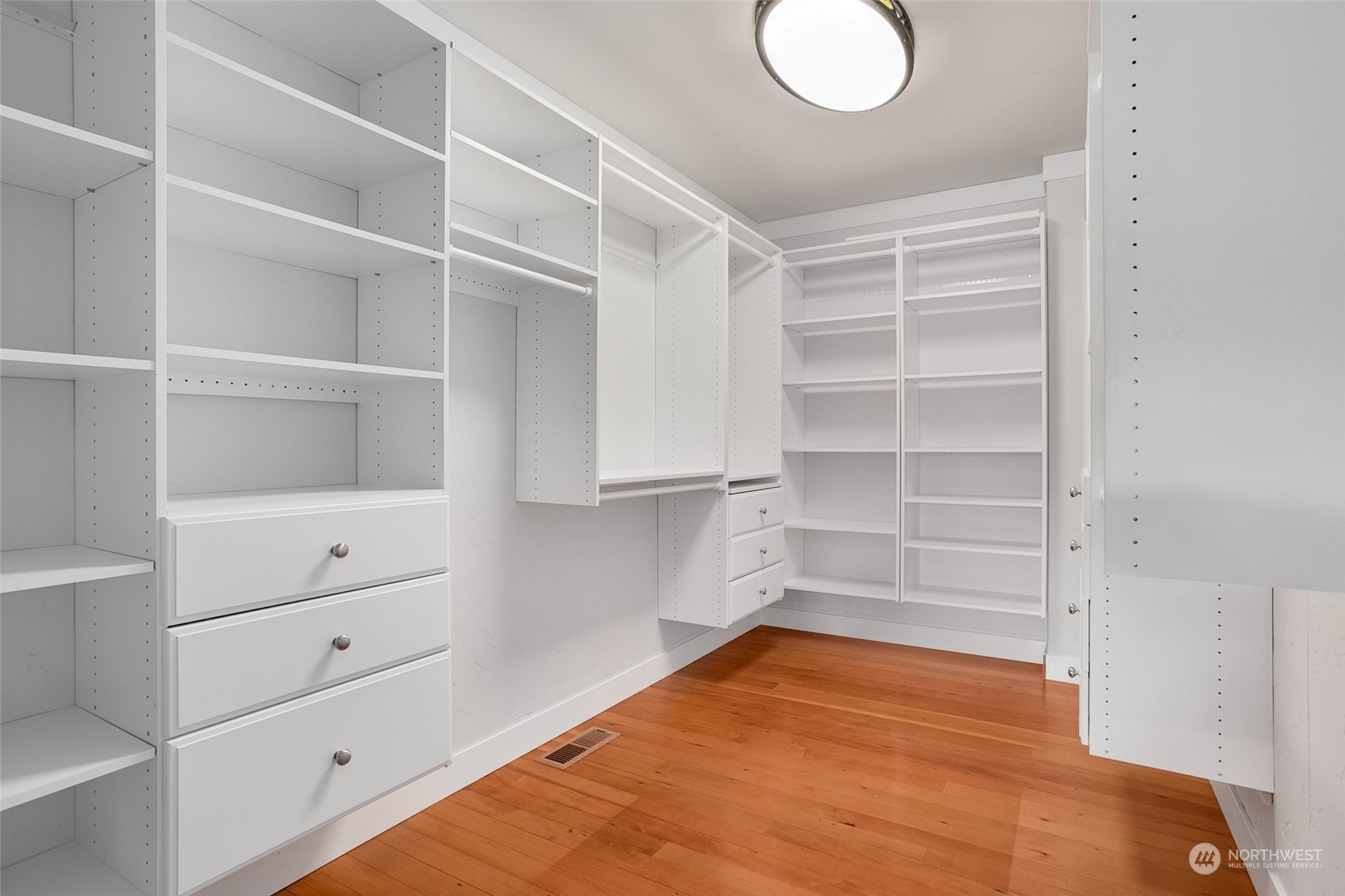 943 Summit Lake Shore Road Northwest Olympia, WA 98502 - Photo 18 of 40 a view of a room with storage and racks on wall
