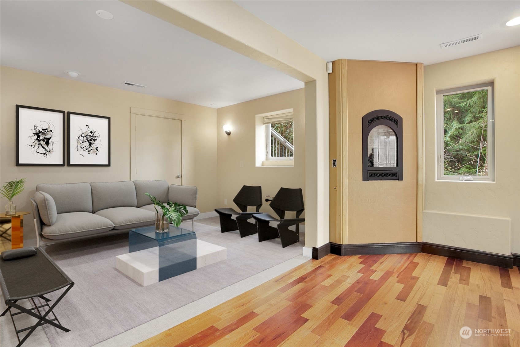 943 Summit Lake Shore Road Northwest Olympia, WA 98502 - Photo 22 of 40 a living room with furniture and wooden floor