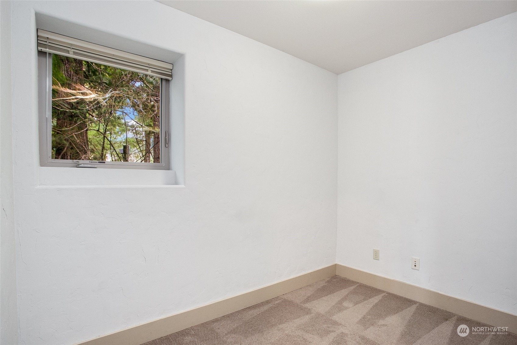 943 Summit Lake Shore Road Northwest Olympia, WA 98502 - Photo 26 of 40 an empty room with a window