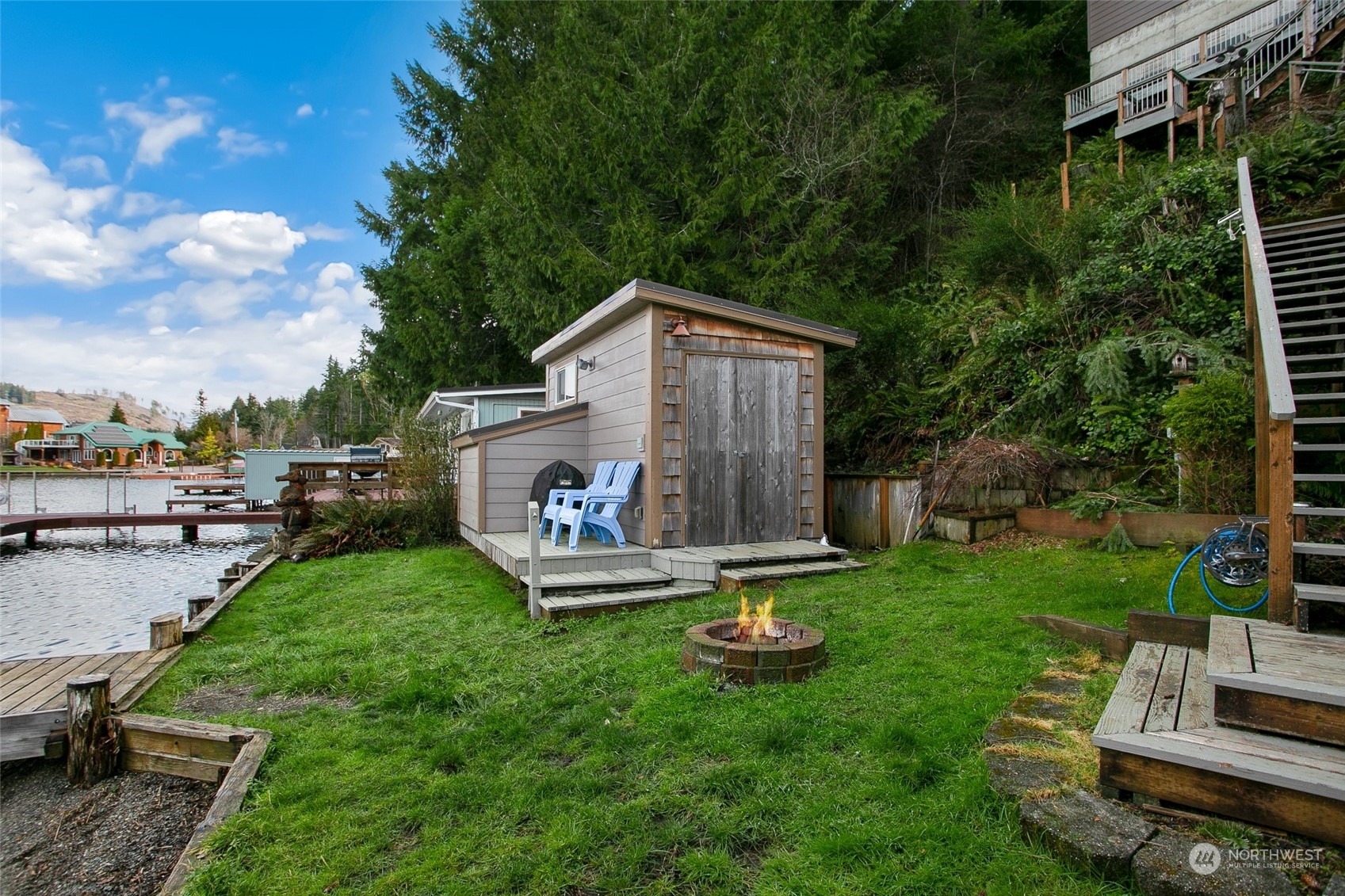943 Summit Lake Shore Road Northwest Olympia, WA 98502 - Photo 29 of 40 a view of backyard with a garden and entertaining space