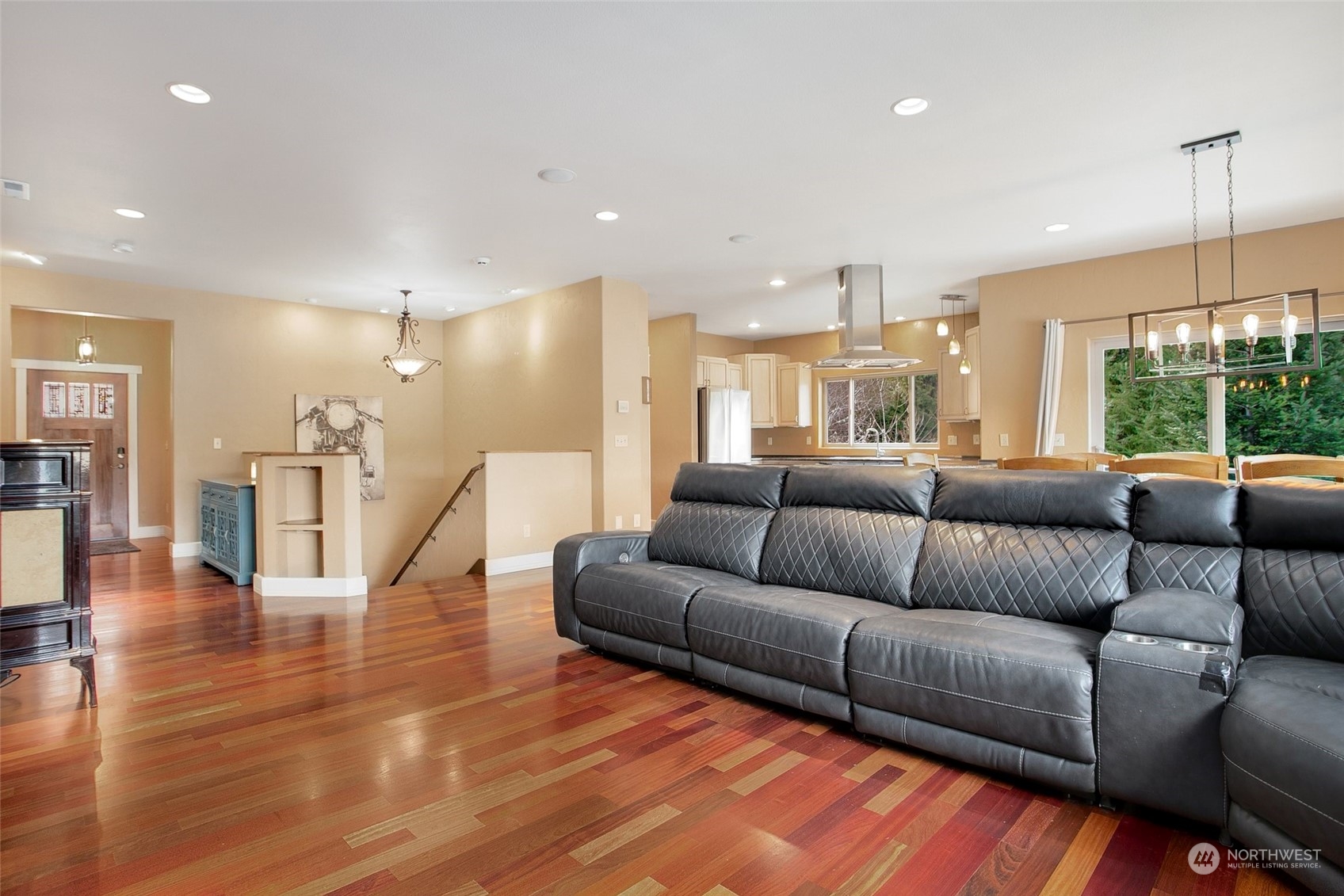 943 Summit Lake Shore Road Northwest Olympia, WA 98502 - Photo 3 of 40 a living room with furniture window and wooden floor