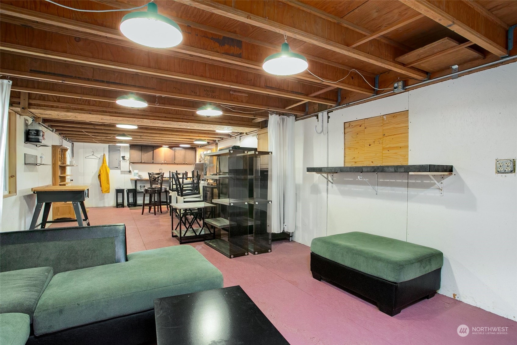 943 Summit Lake Shore Road Northwest Olympia, WA 98502 - Photo 39 of 40 a living room with furniture and a window