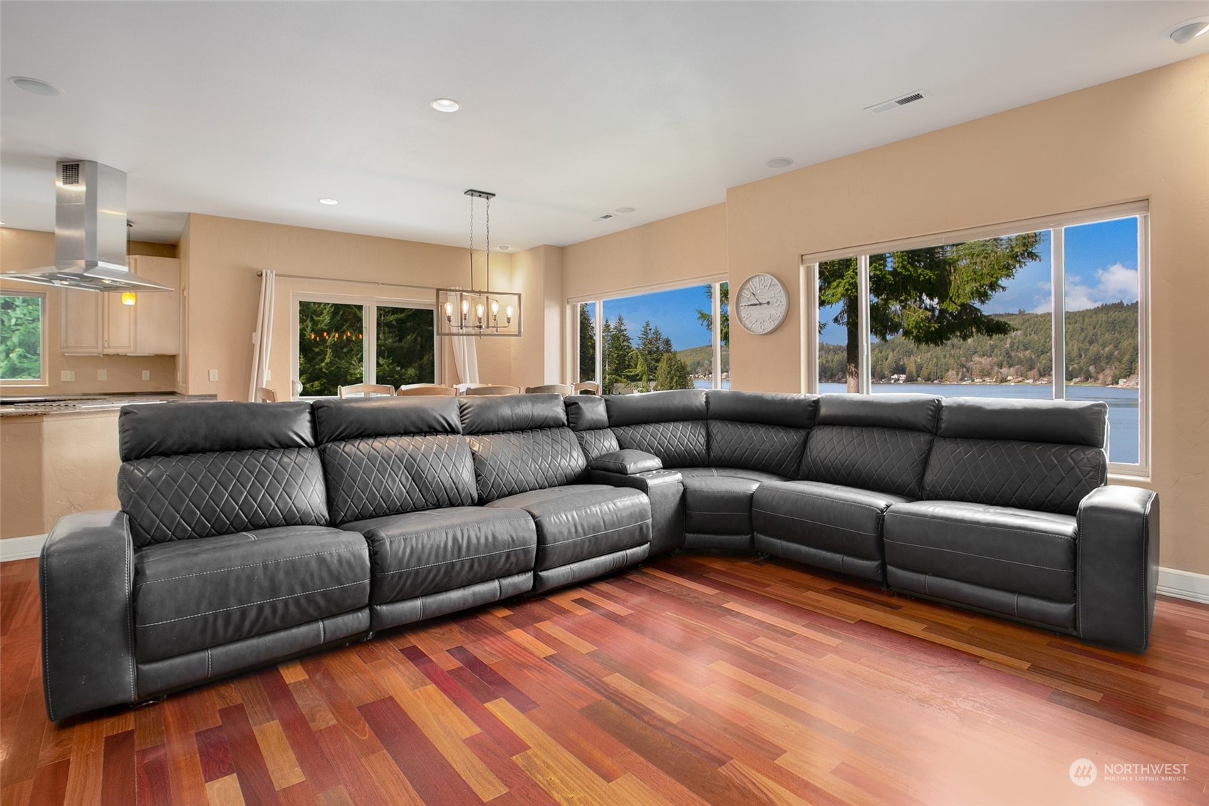 943 Summit Lake Shore Road Northwest Olympia, WA 98502 - Photo 5 of 40 a living room with furniture and a large window