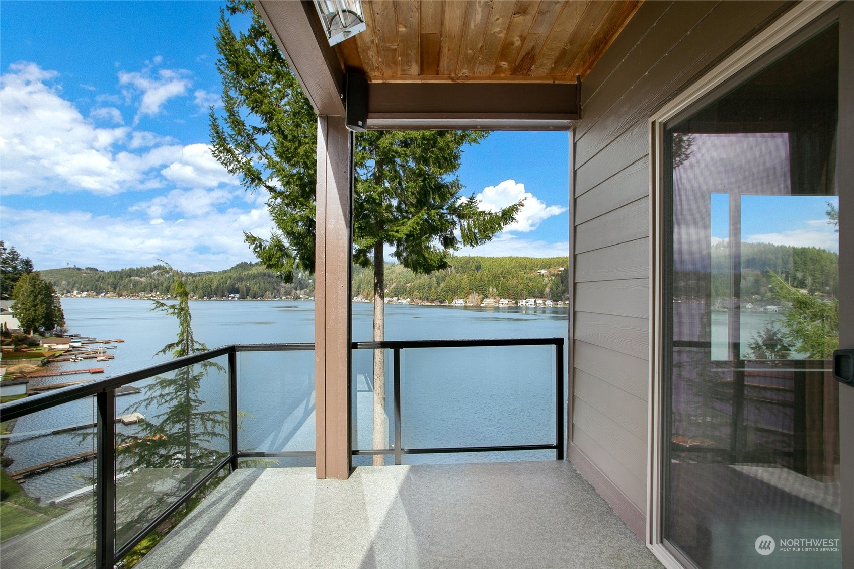 943 Summit Lake Shore Road Northwest Olympia, WA 98502 - Photo 6 of 40 a city view from a balcony