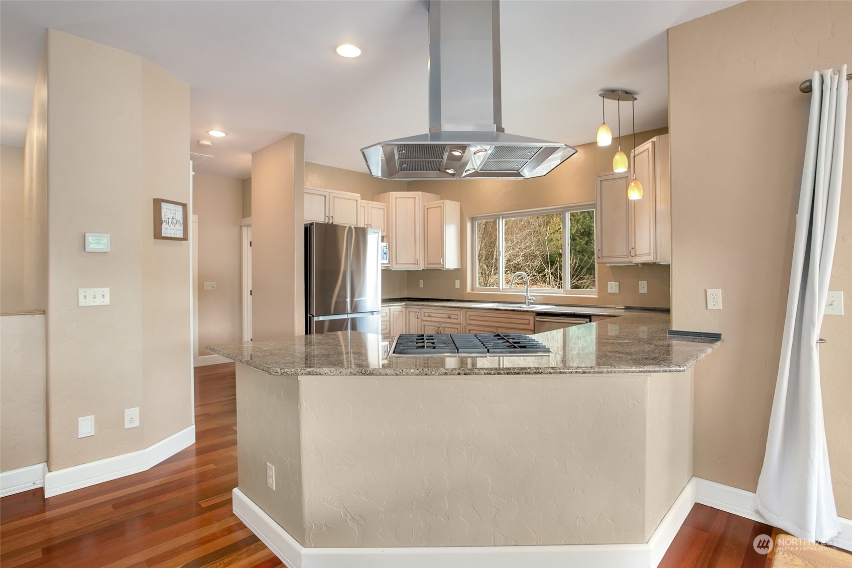 943 Summit Lake Shore Road Northwest Olympia, WA 98502 - Photo 8 of 40 a kitchen with stainless steel appliances granite countertop a refrigerator and a sink