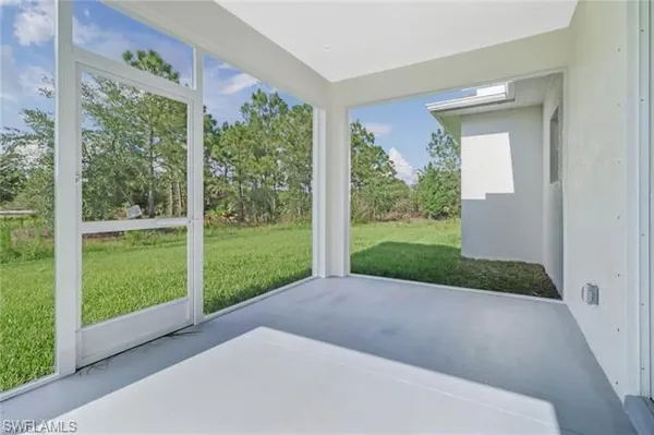 a view of a porch with a yard