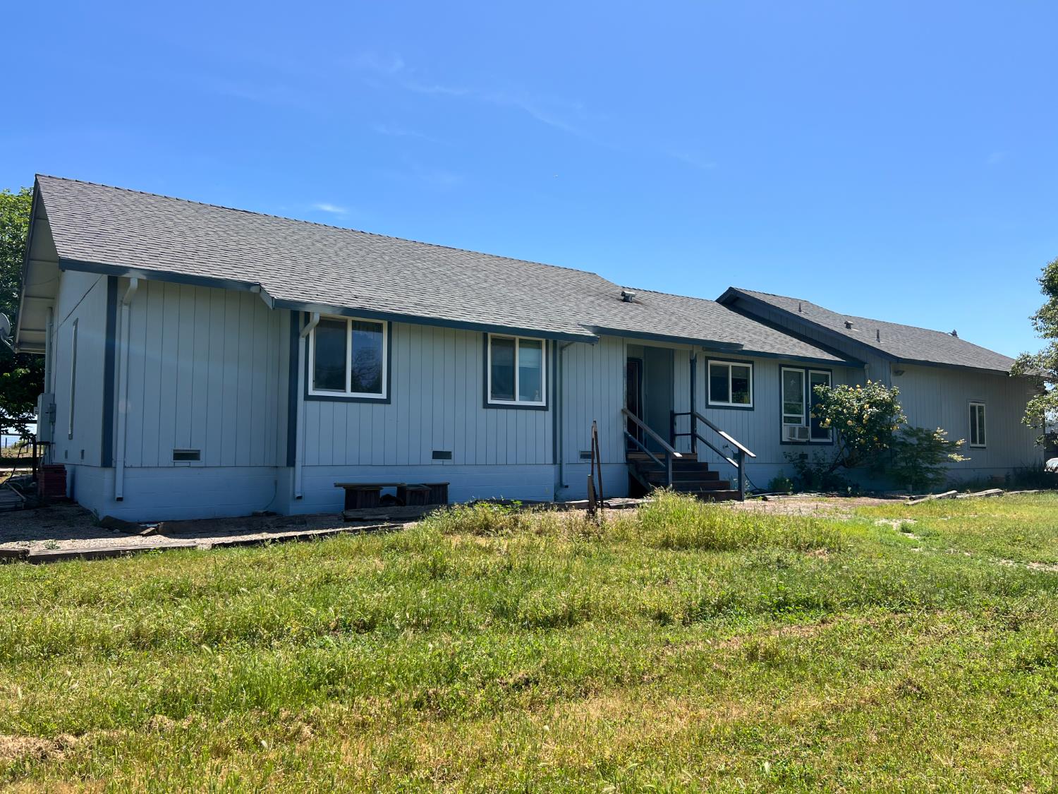 a house view with a garden space