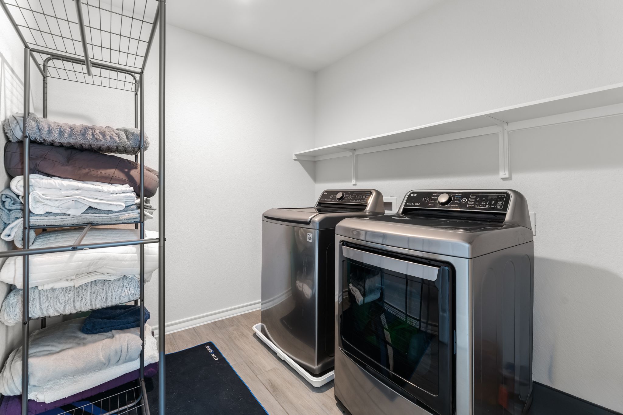 974 Pepperbark Loop Buda, TX 78610 - Photo 26 of 40 Walk-in Laundry room with plenty of storage.