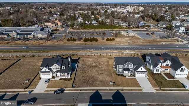 an aerial view of a pool table and chairs