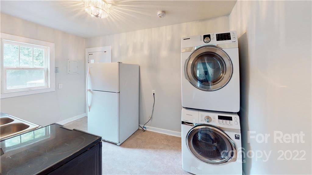 825 Rodey Avenue, Unit 1 Charlotte, NC 28206 - Photo 13 of 15 a view of a kitchen with washer and dryer