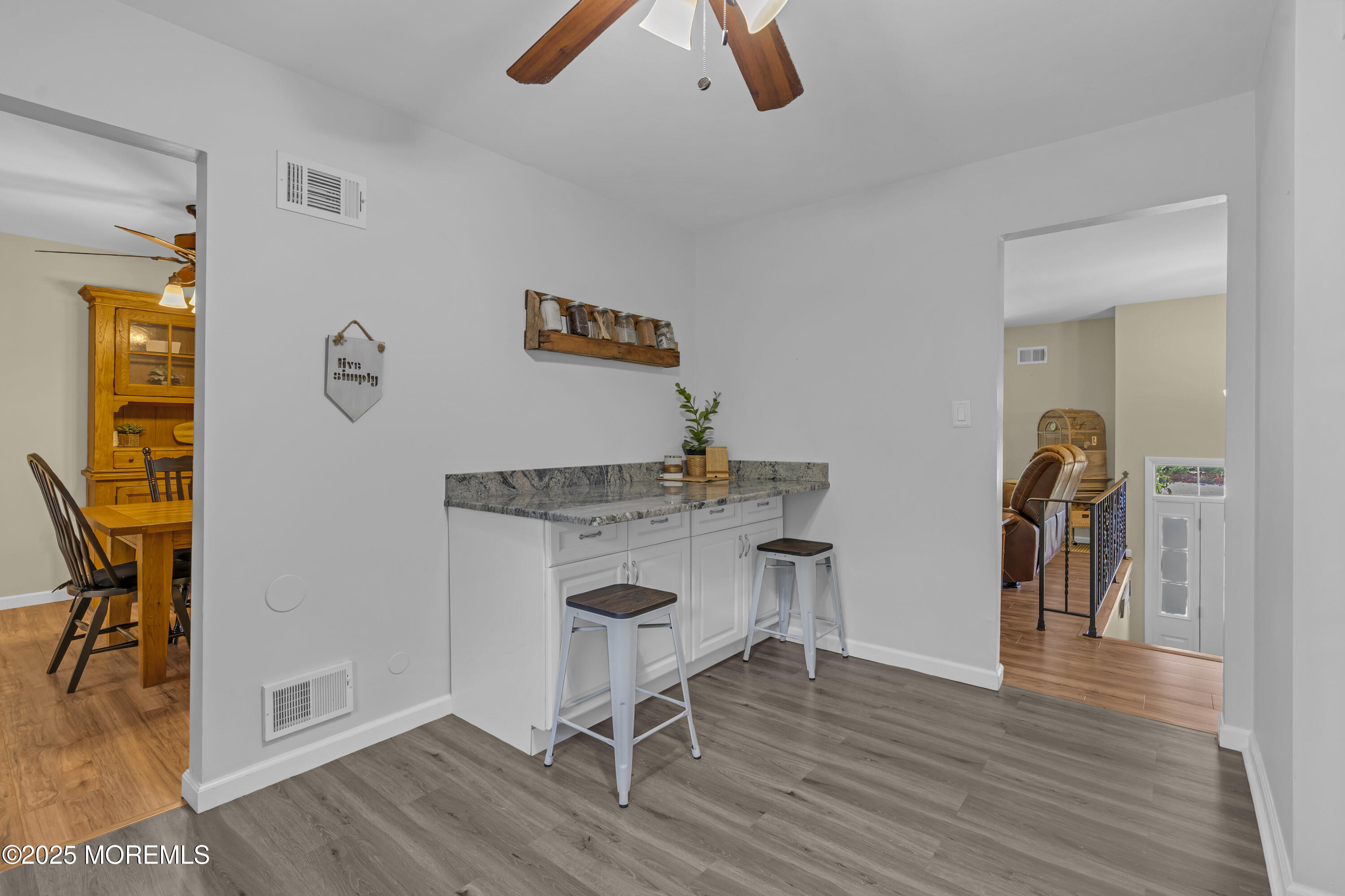 910 Woodlane Road Jackson, NJ 08527 - Photo 16 of 36 a workspace with wooden floor