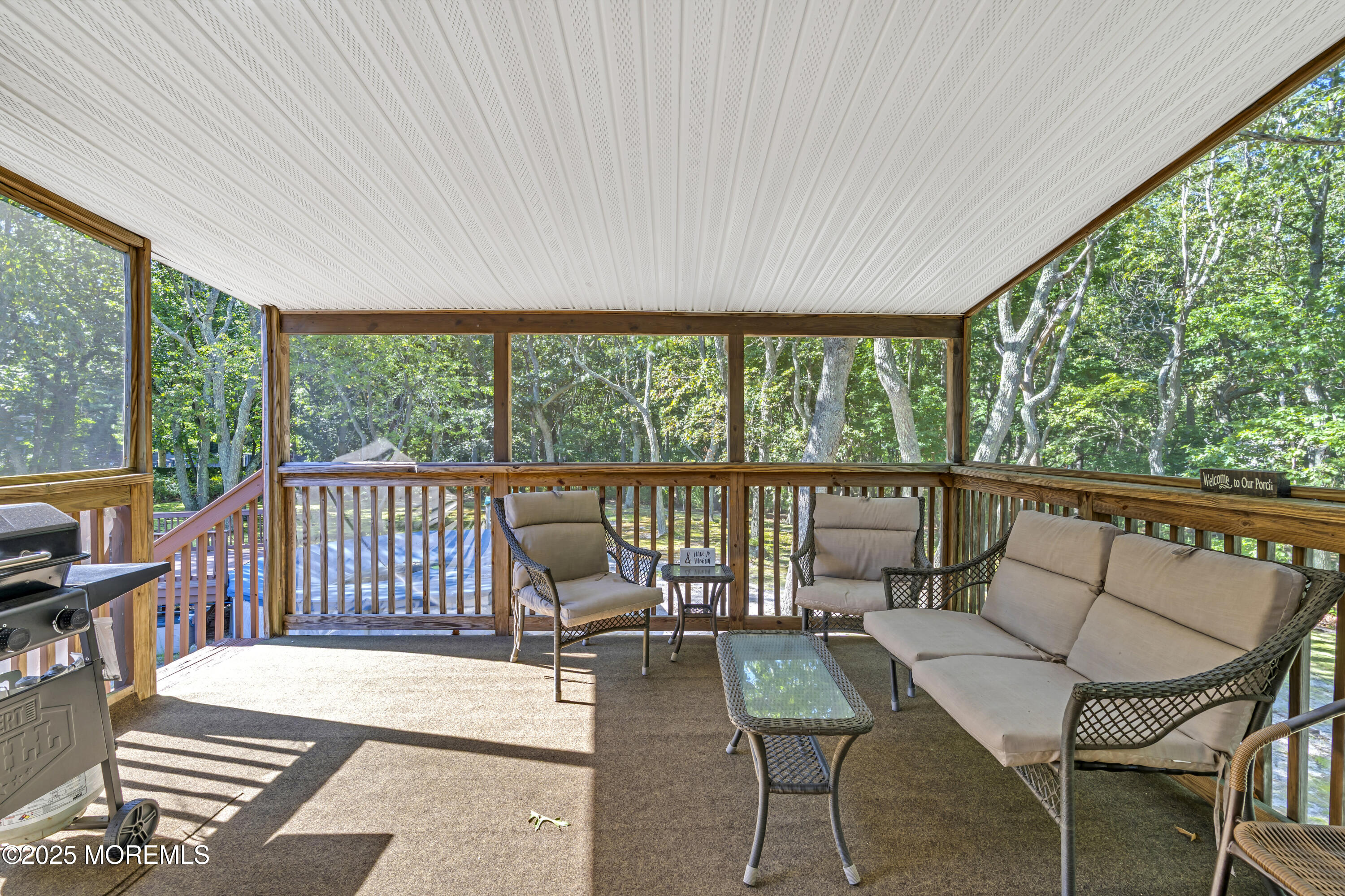 910 Woodlane Road Jackson, NJ 08527 - Photo 17 of 36 a view of a balcony with chairs