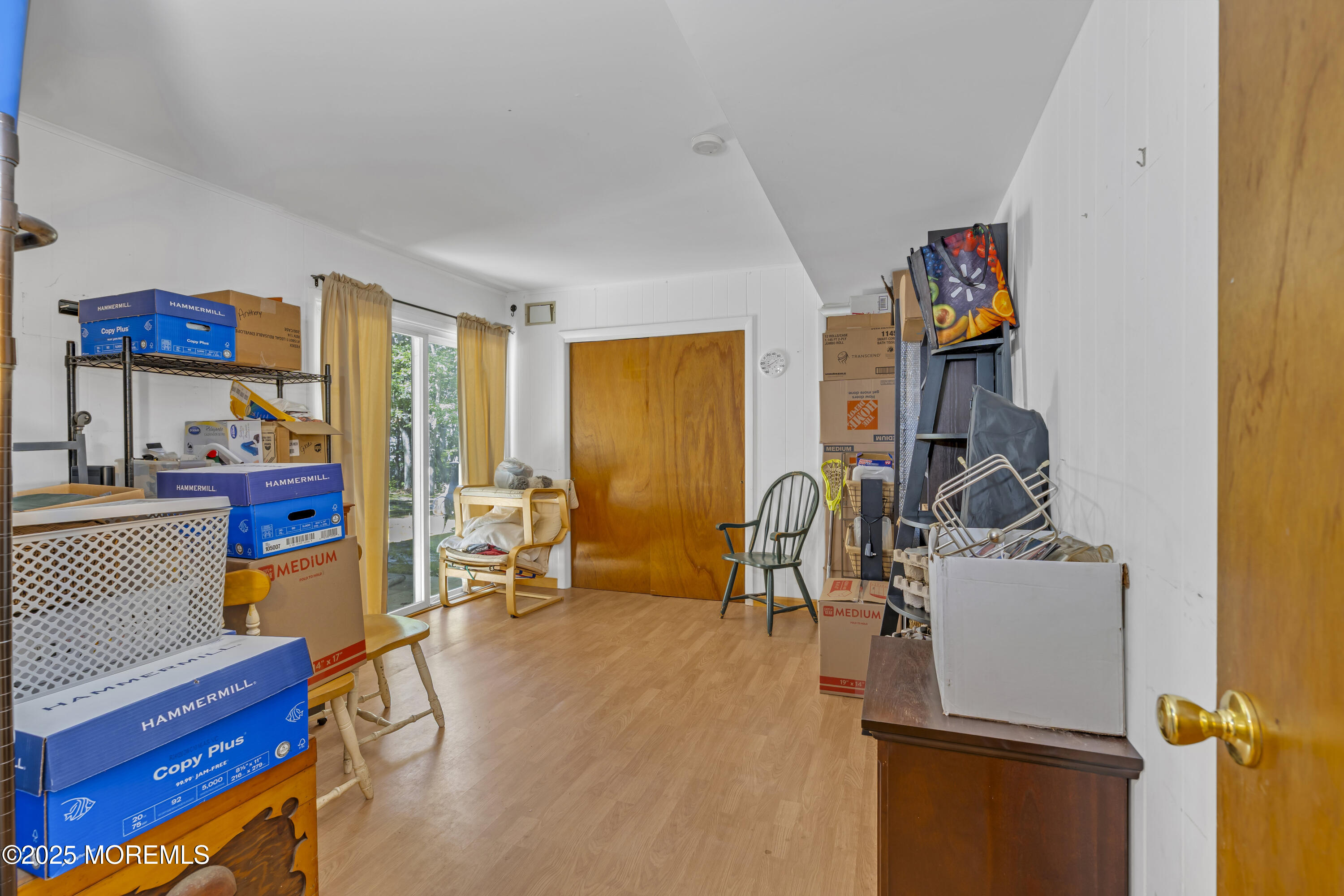 910 Woodlane Road Jackson, NJ 08527 - Photo 27 of 36 a living room with furniture and a window
