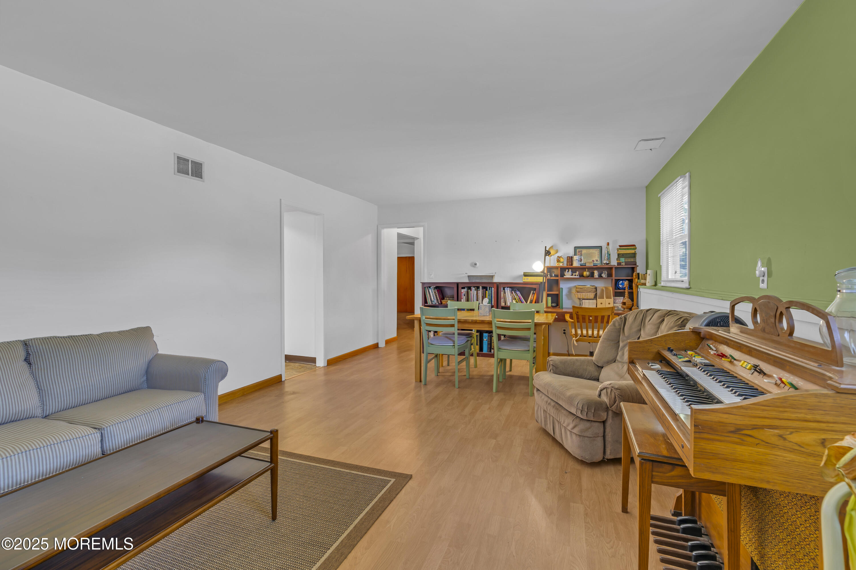 910 Woodlane Road Jackson, NJ 08527 - Photo 32 of 36 a living room with furniture and wooden floor