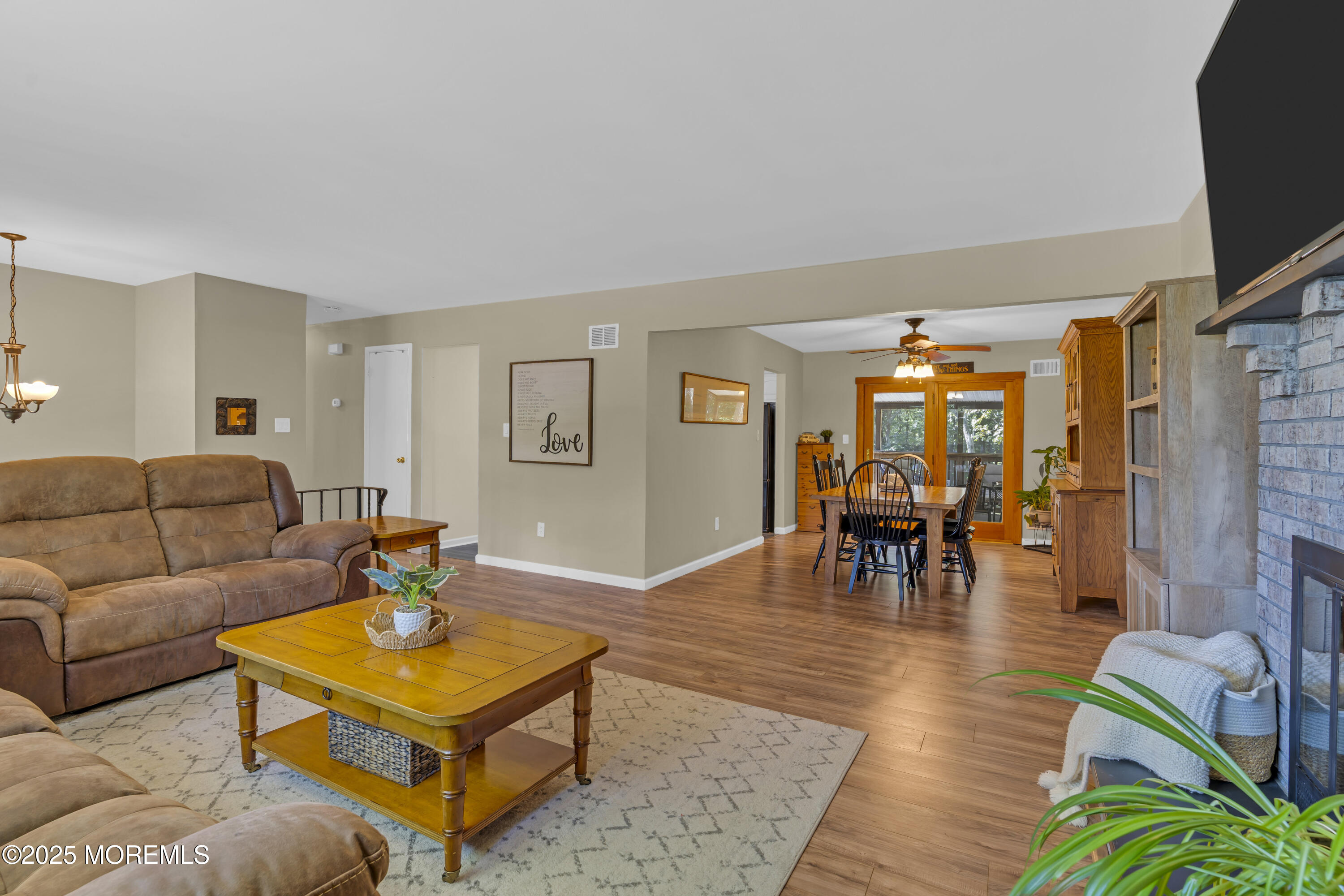 910 Woodlane Road Jackson, NJ 08527 - Photo 6 of 36 a living room with furniture and wooden floor