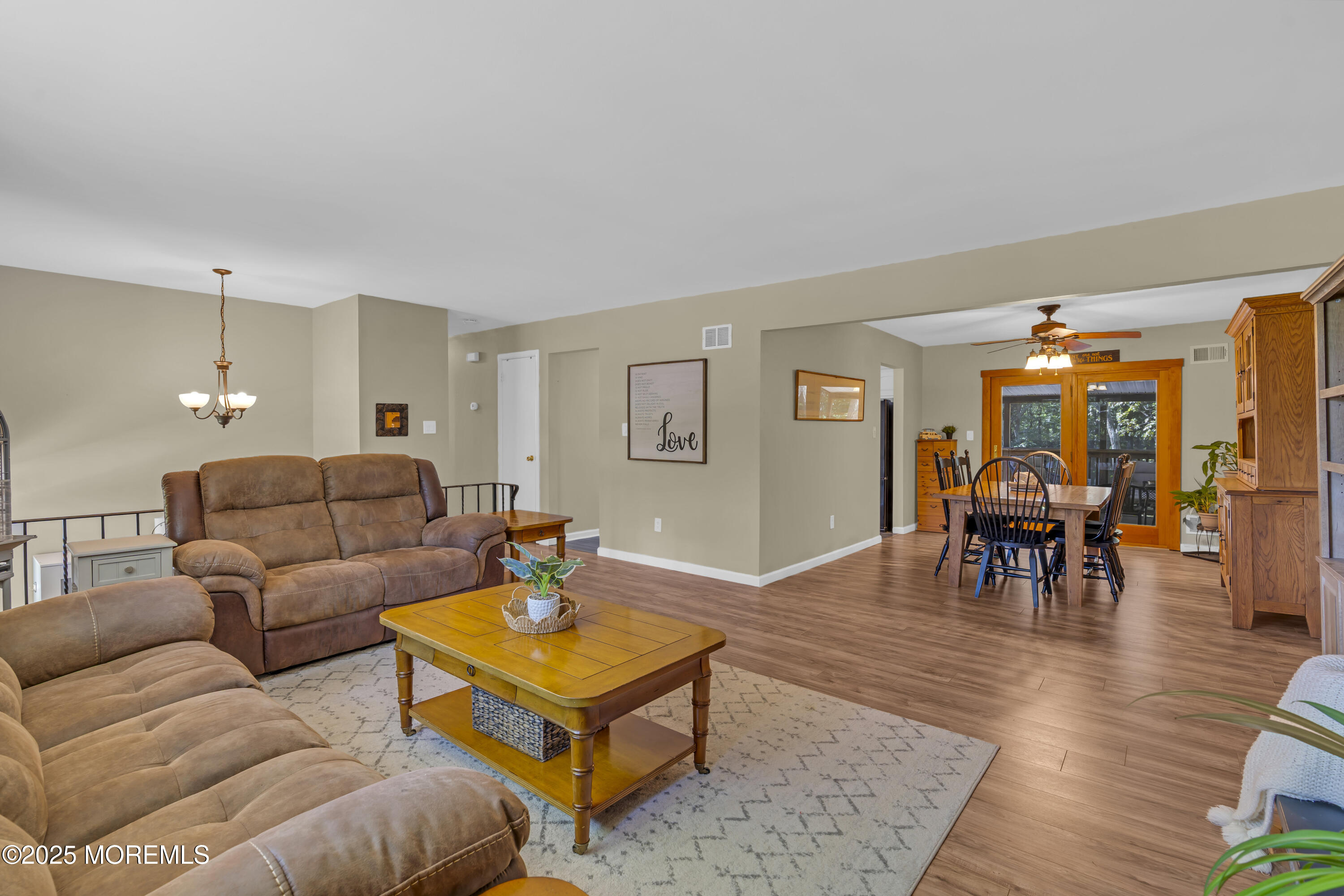 910 Woodlane Road Jackson, NJ 08527 - Photo 7 of 36 a living room with furniture and wooden floor