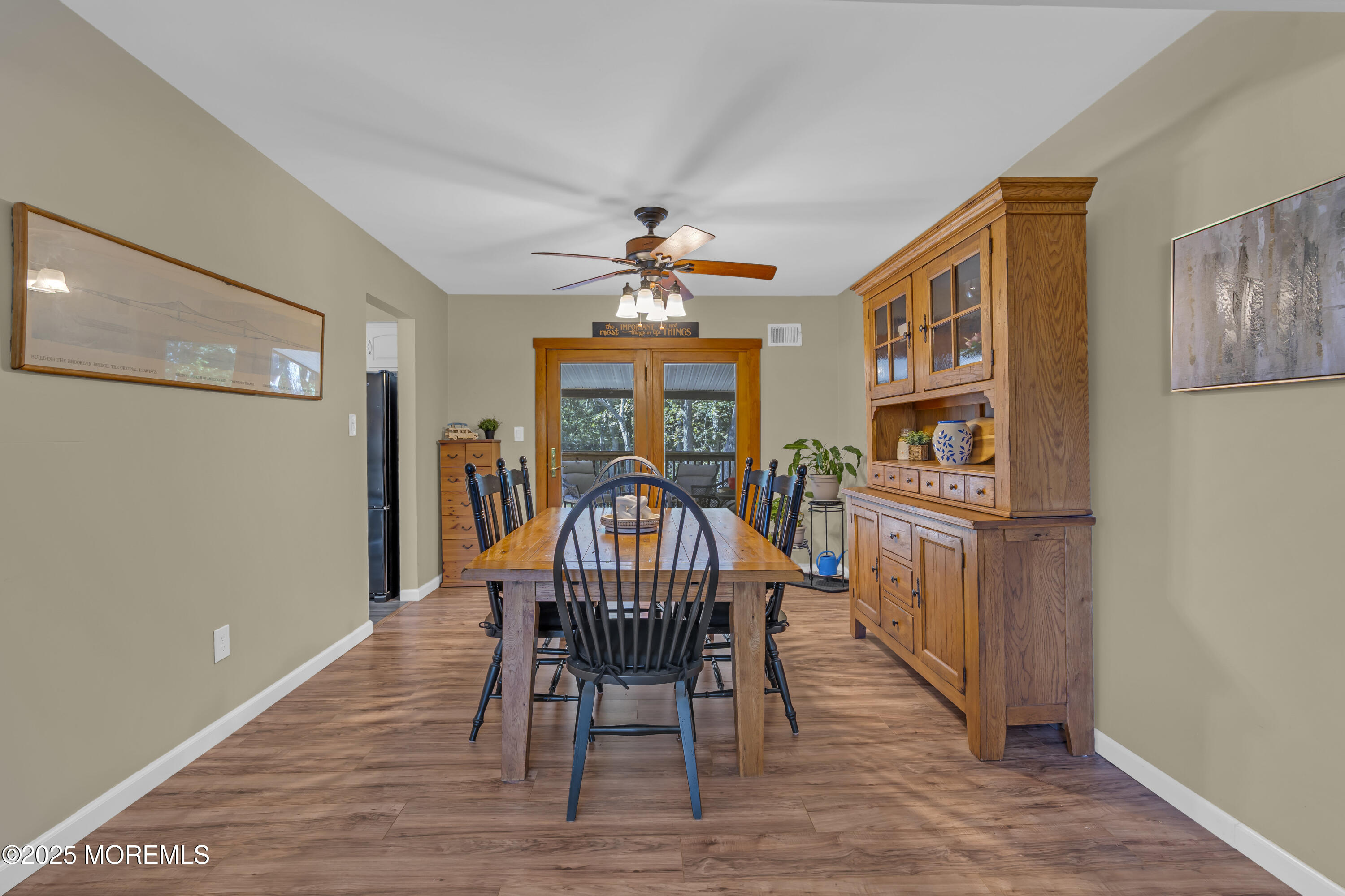 910 Woodlane Road Jackson, NJ 08527 - Photo 10 of 36 a view of a dining room with furniture window and wooden floor