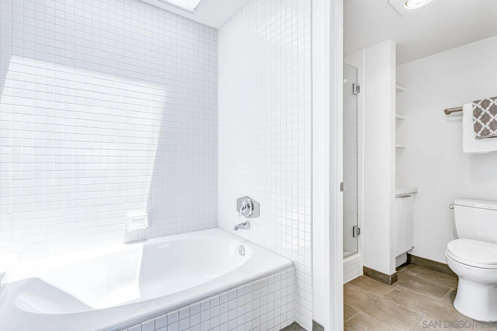 1031 Reliance Way Del Mar, CA 92014 - Photo 16 of 33 a bathroom with a bathtub and a toilet