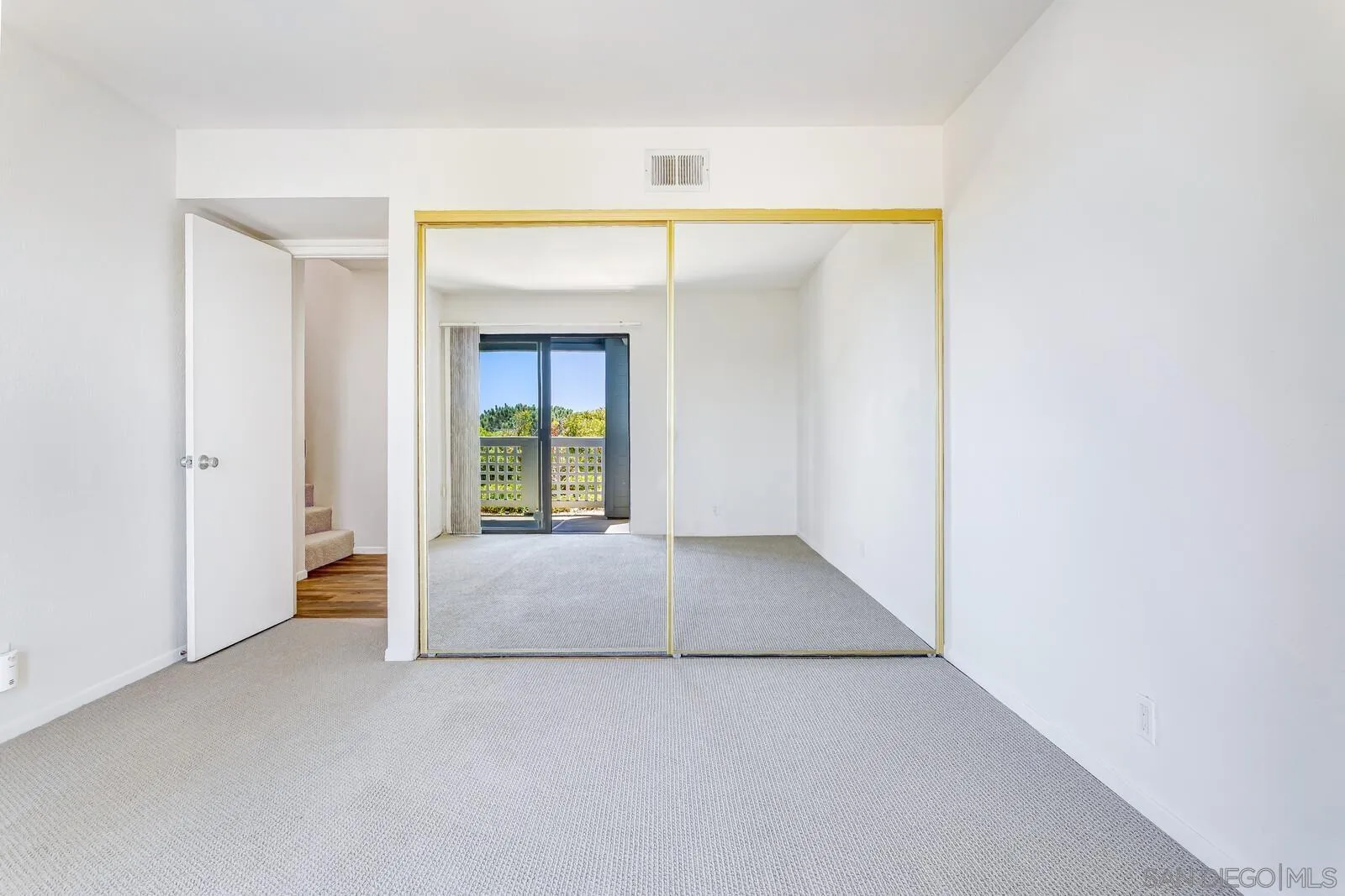 1031 Reliance Way Del Mar, CA 92014 - Photo 19 of 33 a view of an empty room with a fireplace