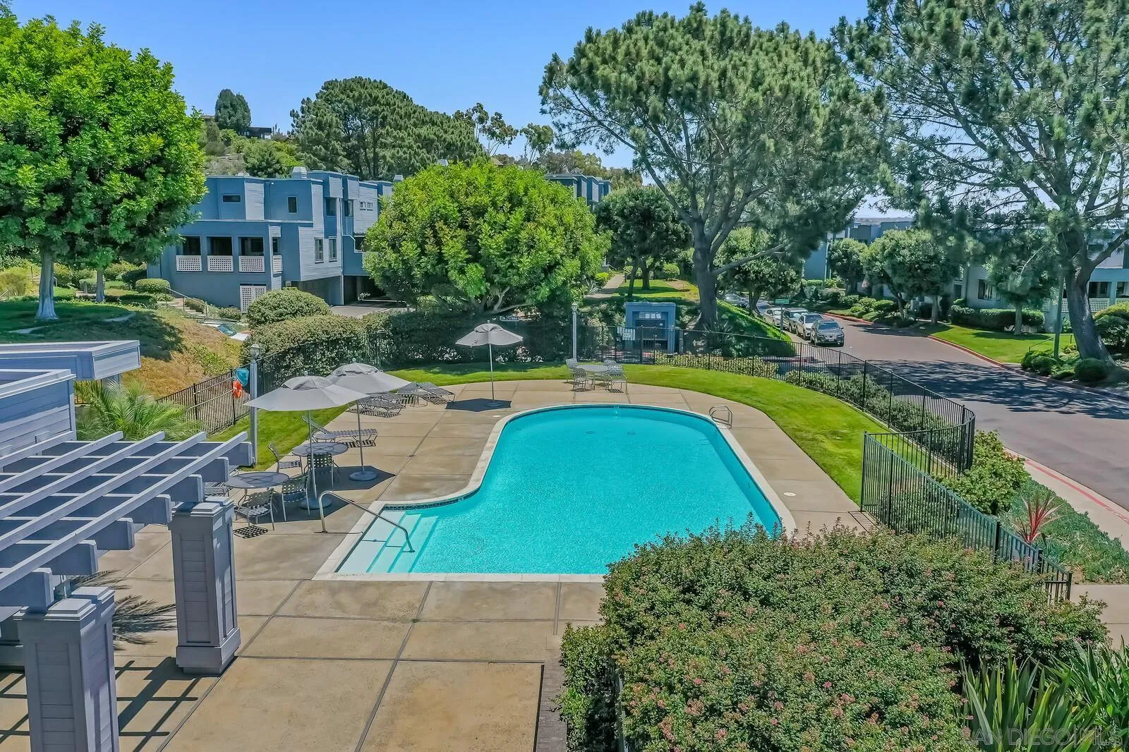 1031 Reliance Way Del Mar, CA 92014 - Photo 29 of 33 a view of a swimming pool with a patio