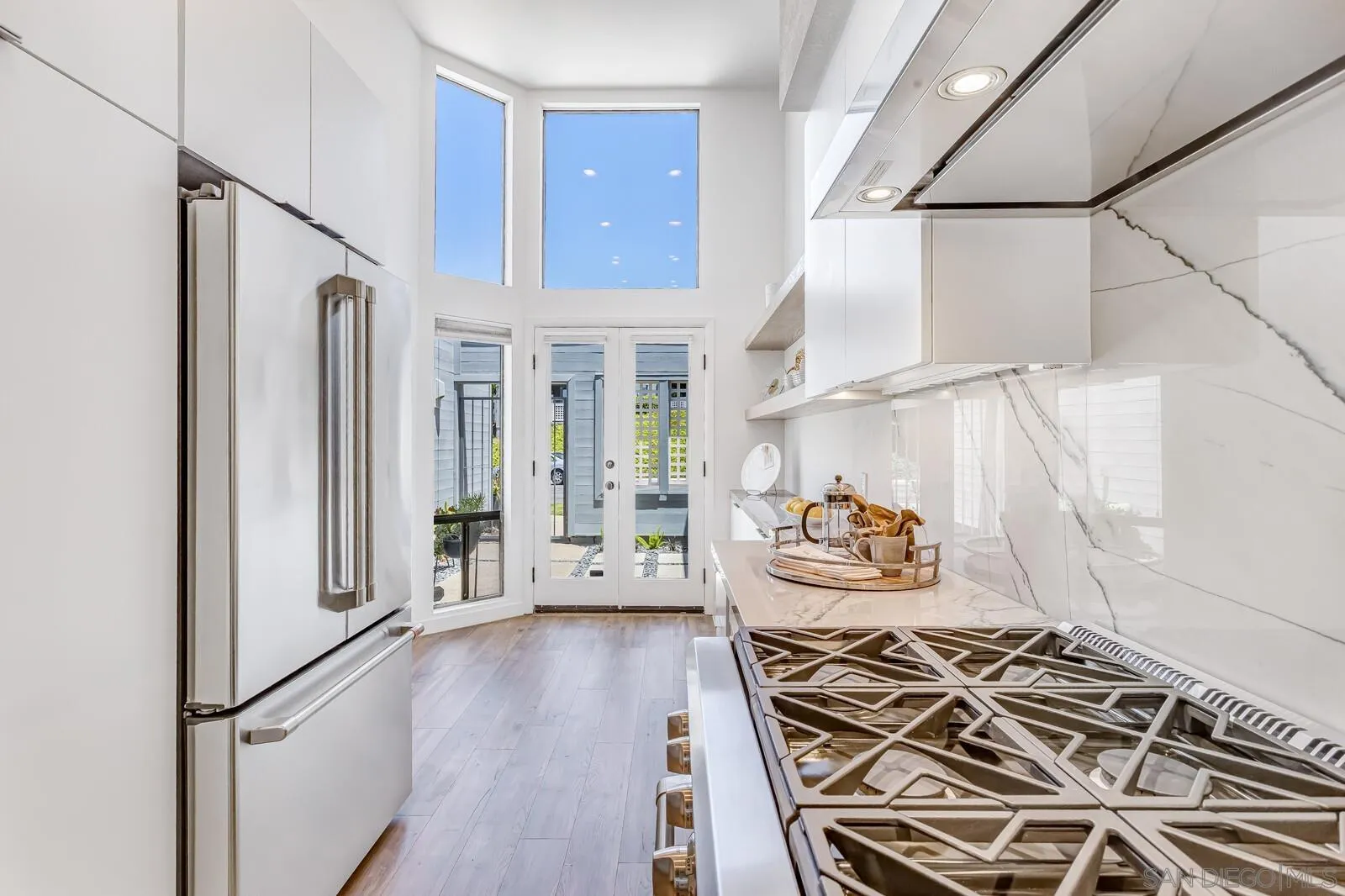 1031 Reliance Way Del Mar, CA 92014 - Photo 7 of 33 a very nice looking bedroom with wooden floor and furniture