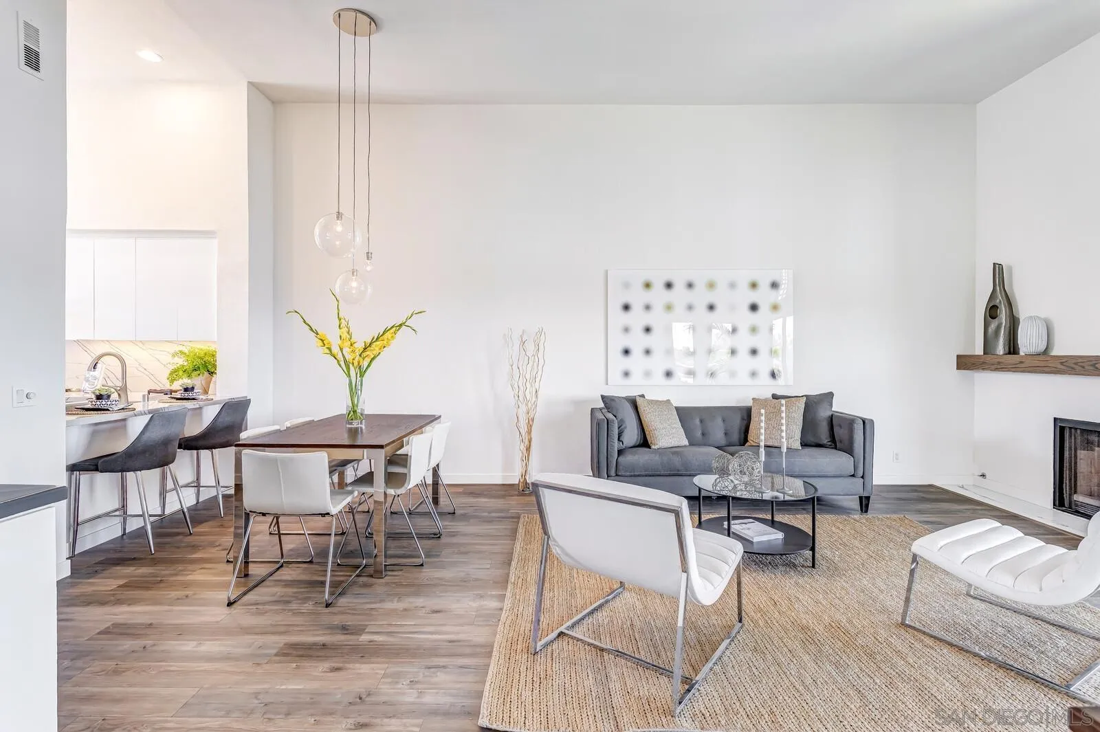 1031 Reliance Way Del Mar, CA 92014 - Photo 10 of 33 a living room with furniture and a wooden floor