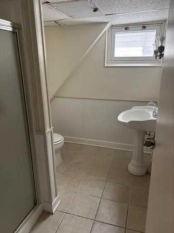 a bathroom with a sink and a toilet