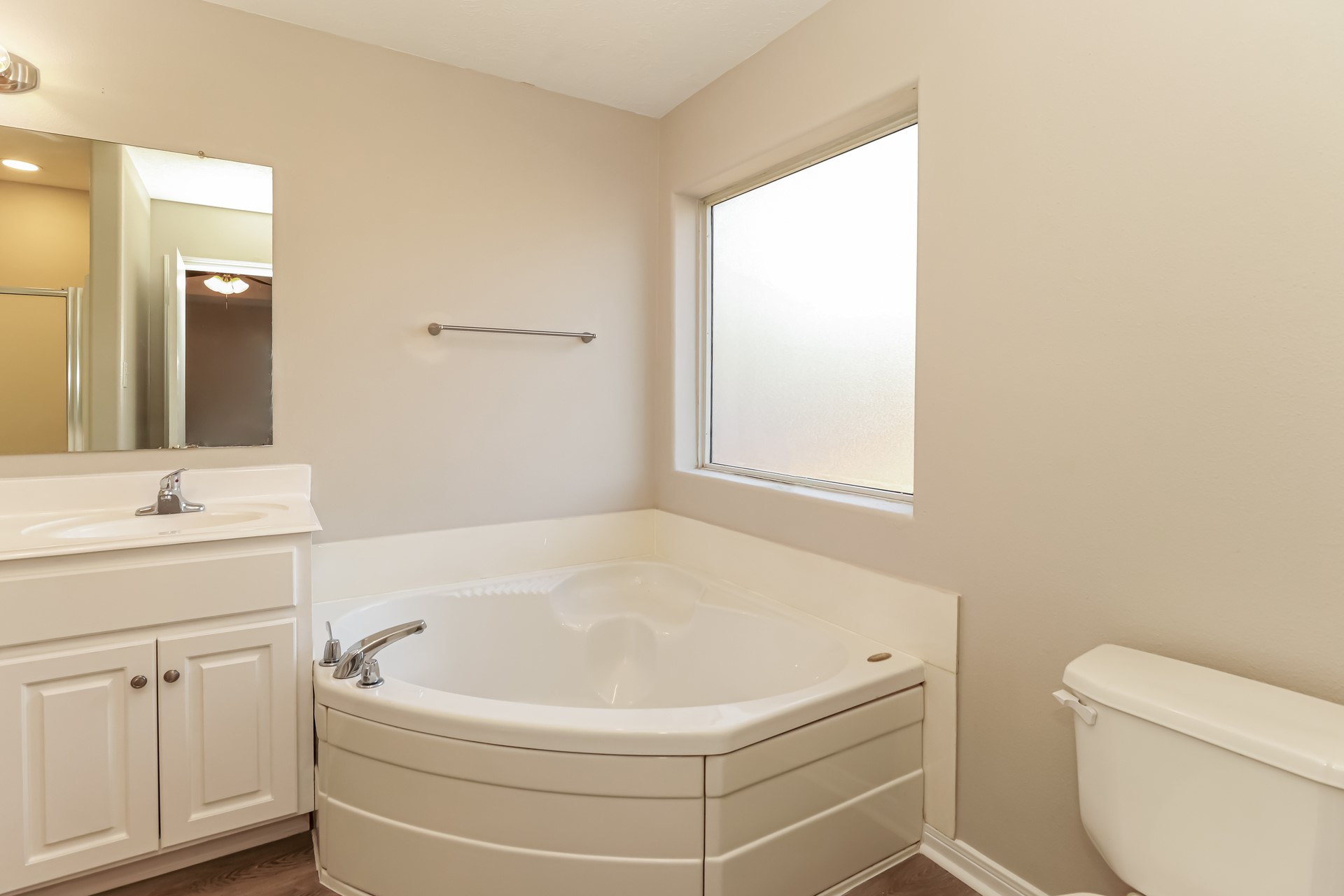 16360 Hidden River Court Conroe, TX 77302 - Photo 12 of 16 a white bath tub sitting next to a white toilet