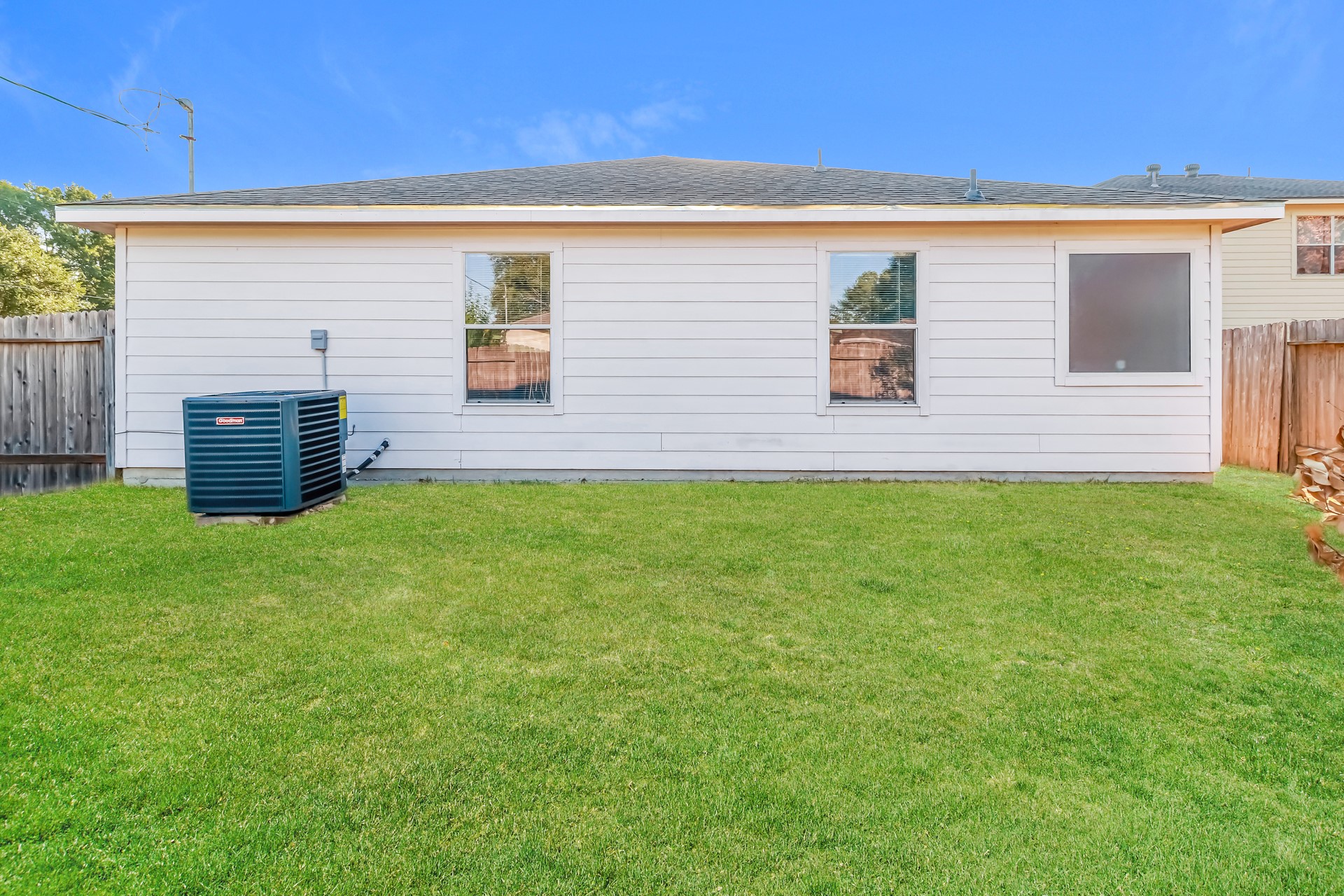 16360 Hidden River Court Conroe, TX 77302 - Photo 2 of 16 a backyard of a house with lots of green space