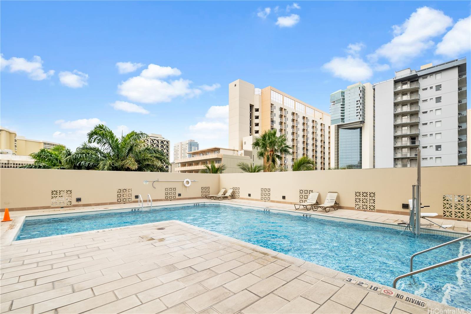 2240 Kūhiō Avenue, Unit 2308 Honolulu, HI 96815 - Photo 15 of 21 a view of pool with tall buildings
