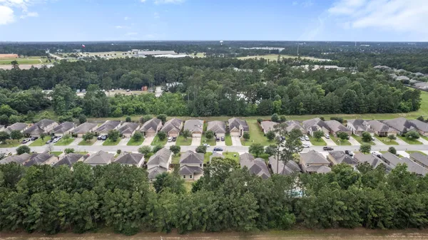 an aerial view of mountain with lake view