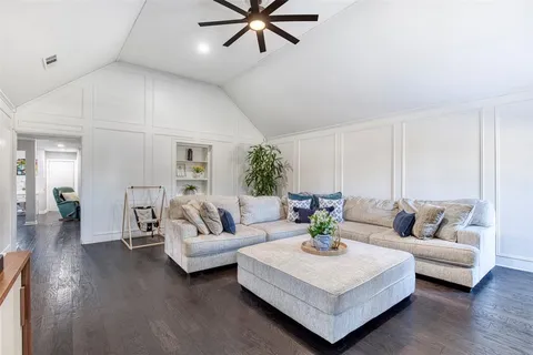a kitchen with sink and cabinets