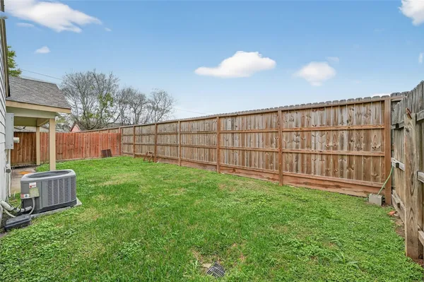 a view of a backyard with a garden