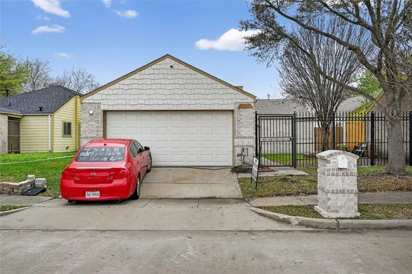 a front view of a house with a garage