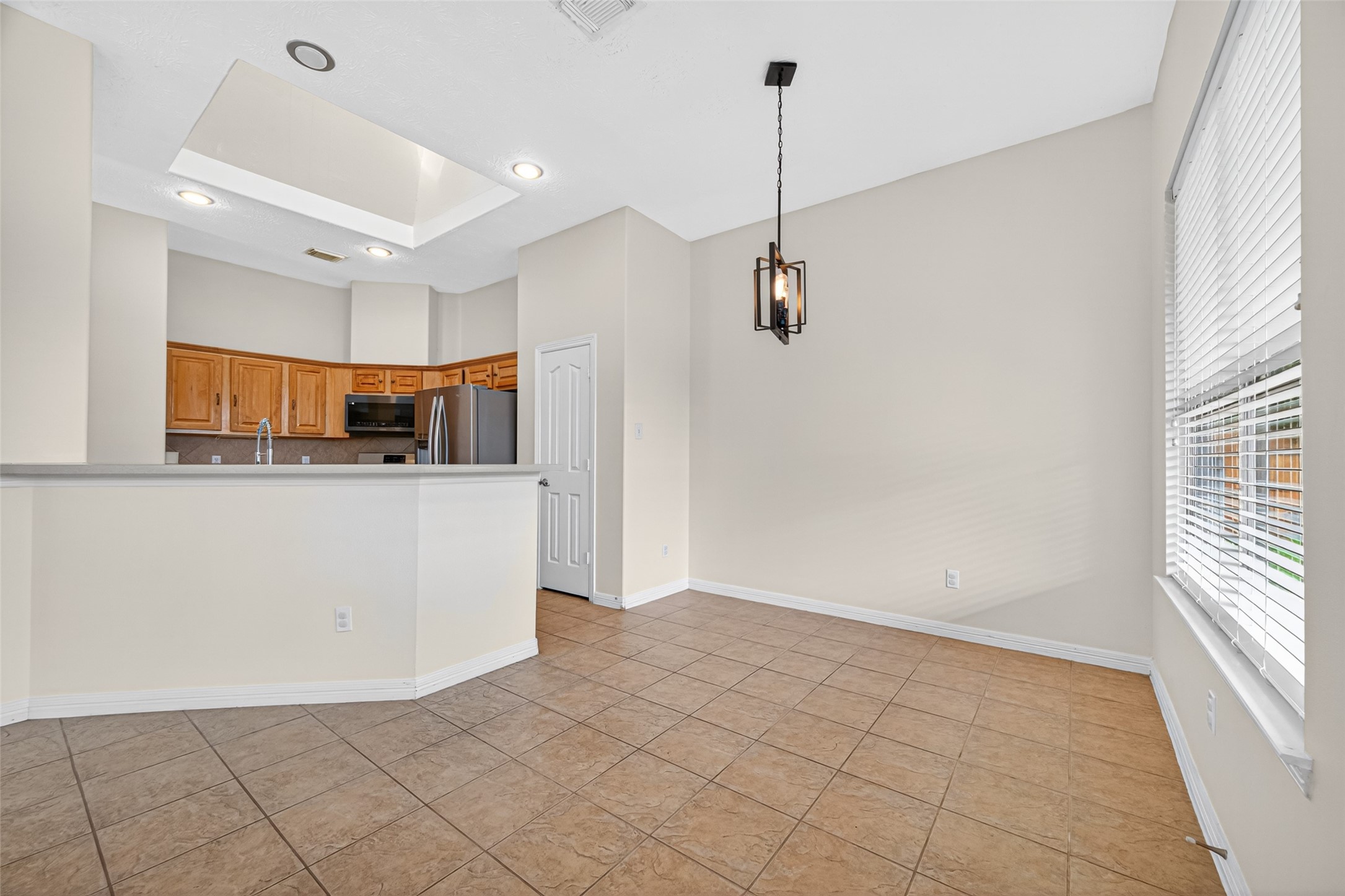 23914 Glengate Drive Spring, TX 77373 - Photo 15 of 49 a view of a kitchen with electric appliances
